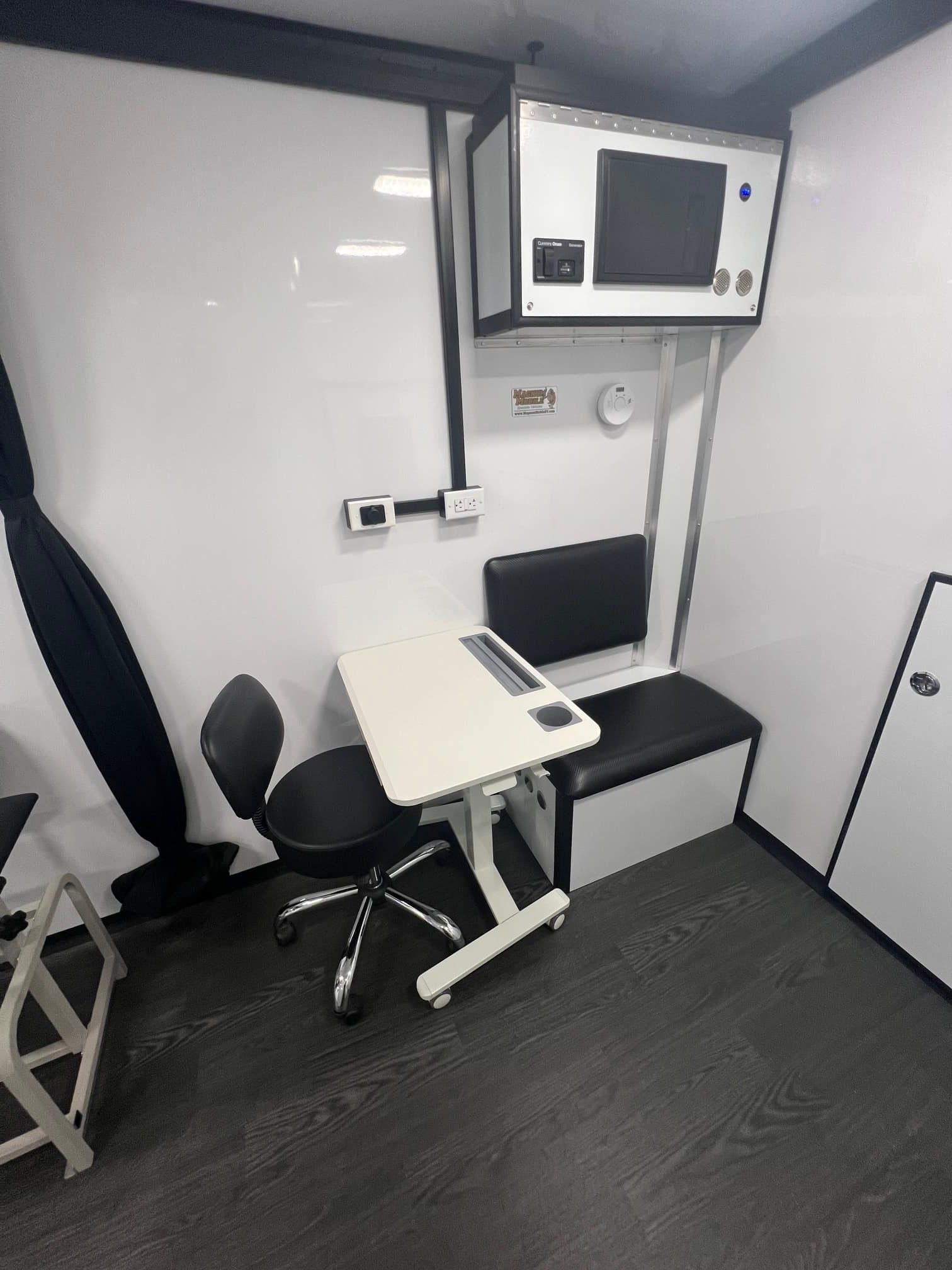 Magnum-Mobile-26ft-Mobile-Medical-Clinic-Professional-Series-Desk-Bench-Seating-5